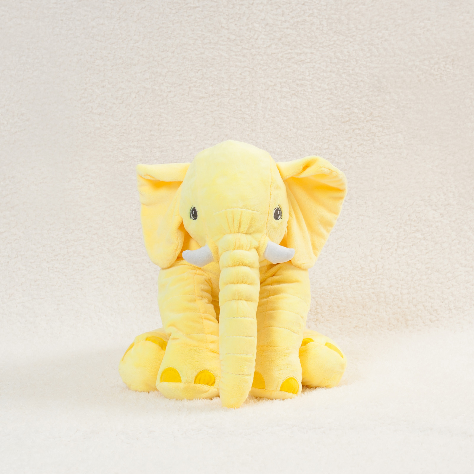 yellow stuffed elephant